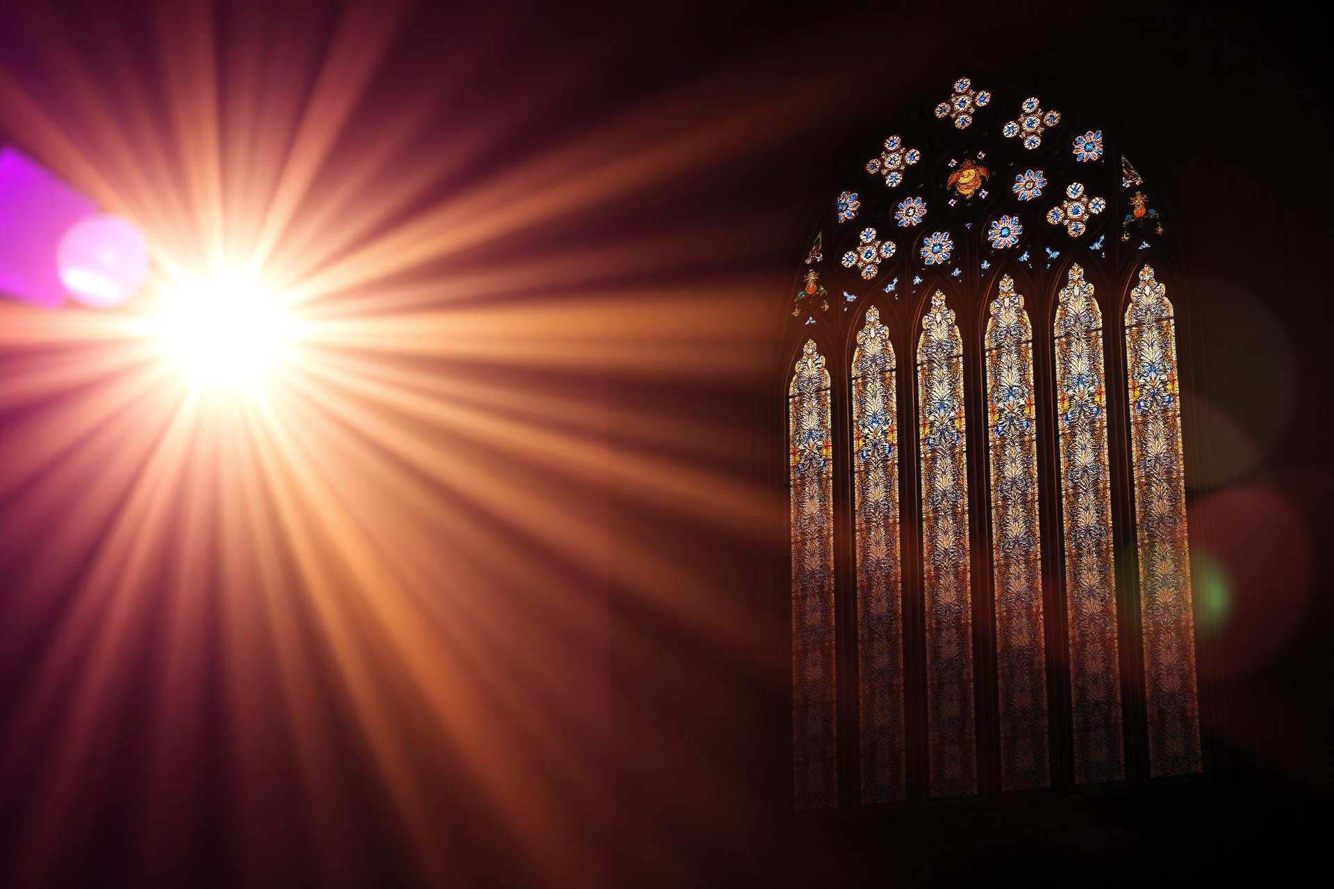 Light streaming through a stained-glass church window